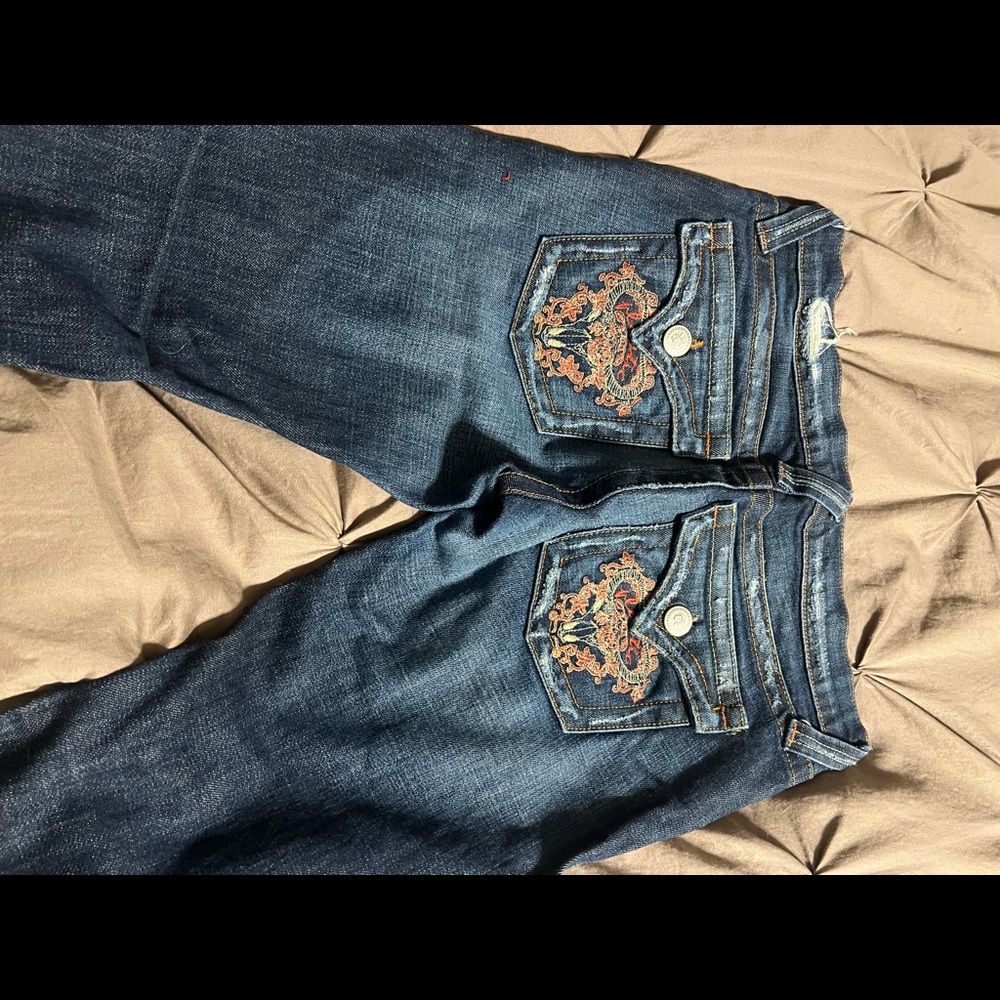 Flare jeans with detail on back pockets
